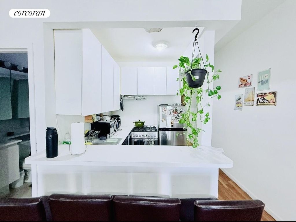 242 East 50th Street, - Photo 3