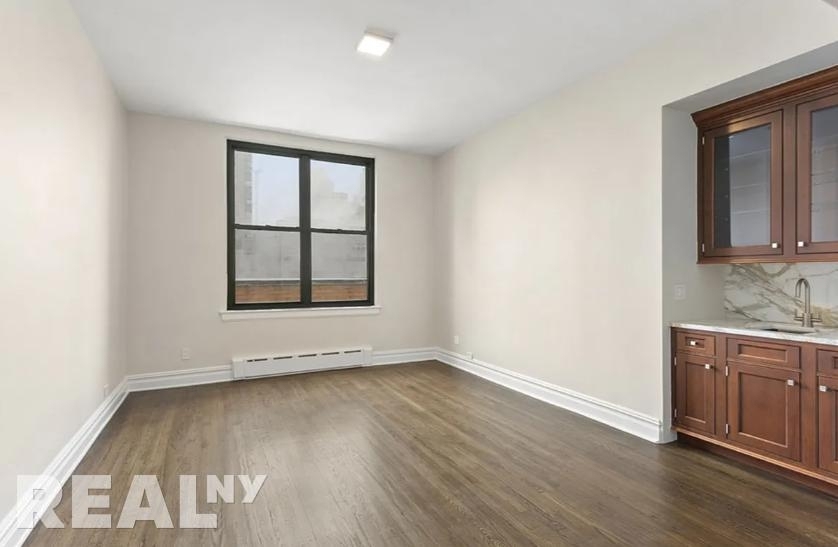 E 68th St - Photo 3
