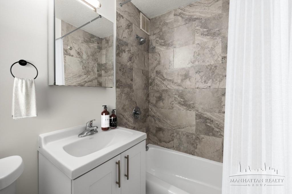 East 28th - Photo 8