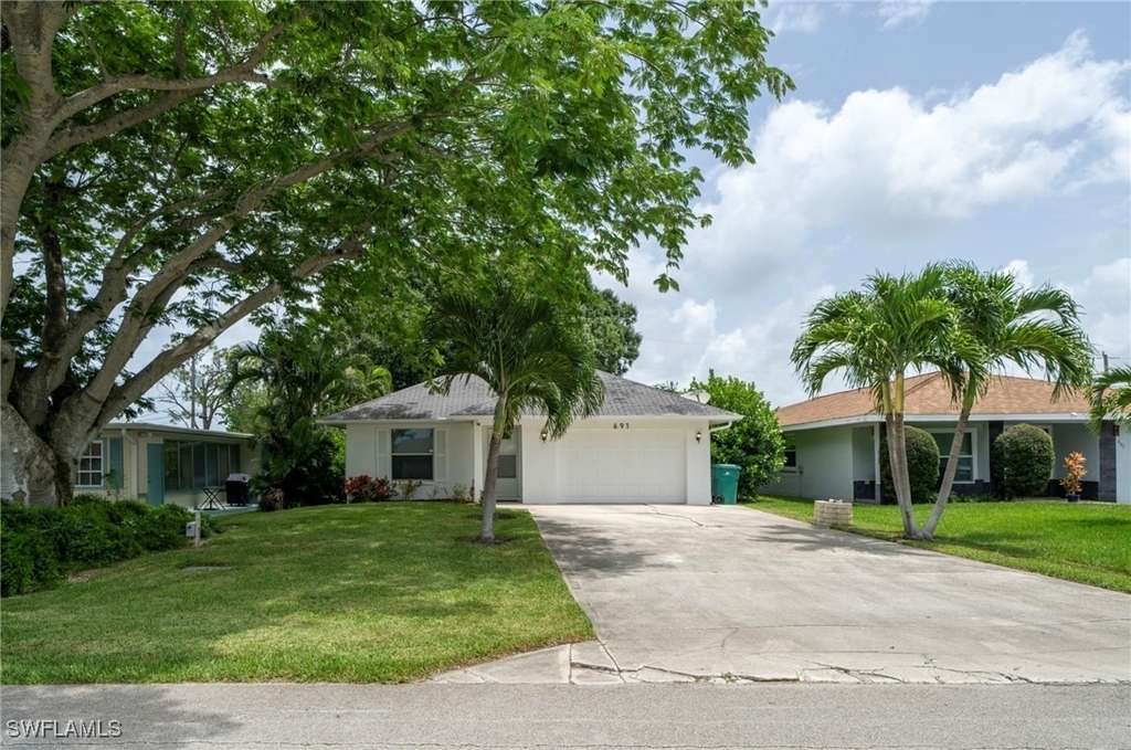 691 102nd Avenue N - Photo 0