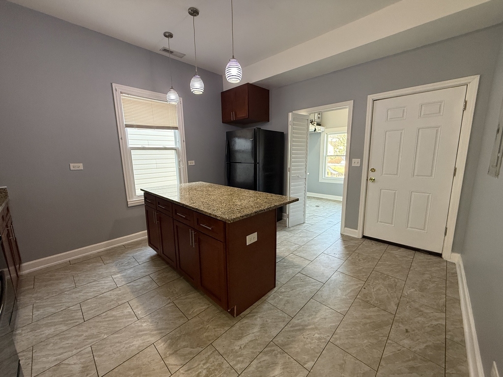 9738 S Avenue L - Photo 2