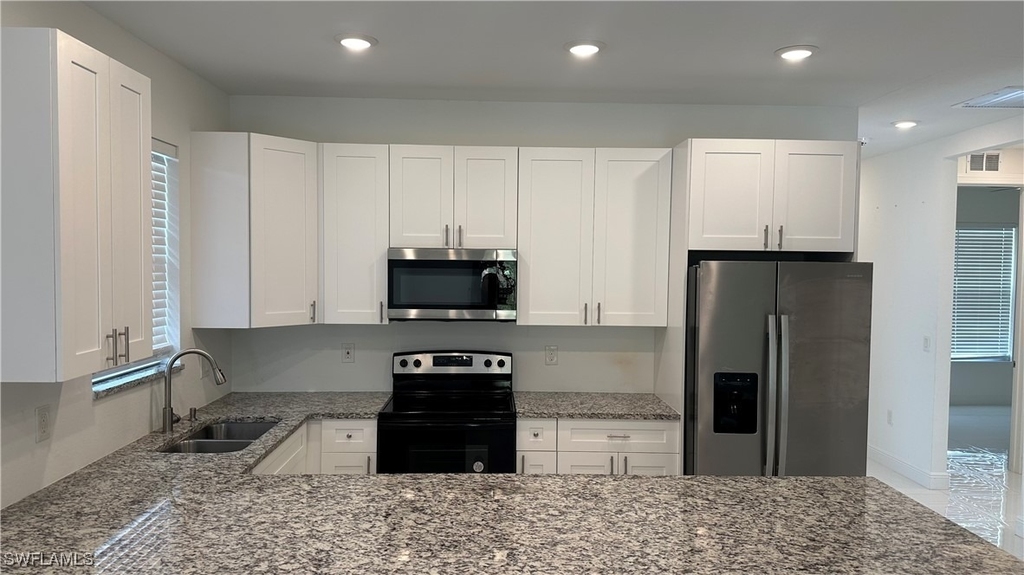 5901 Rita Avenue N - Photo 6