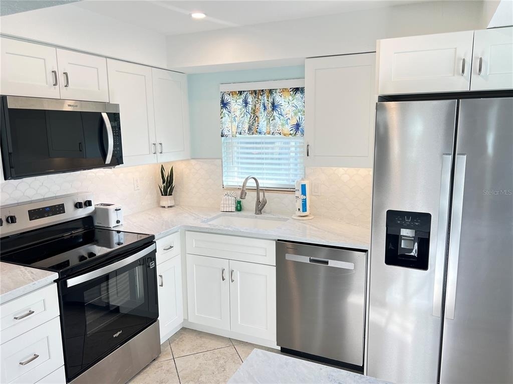 6154 Midnight Pass Road - Photo 1