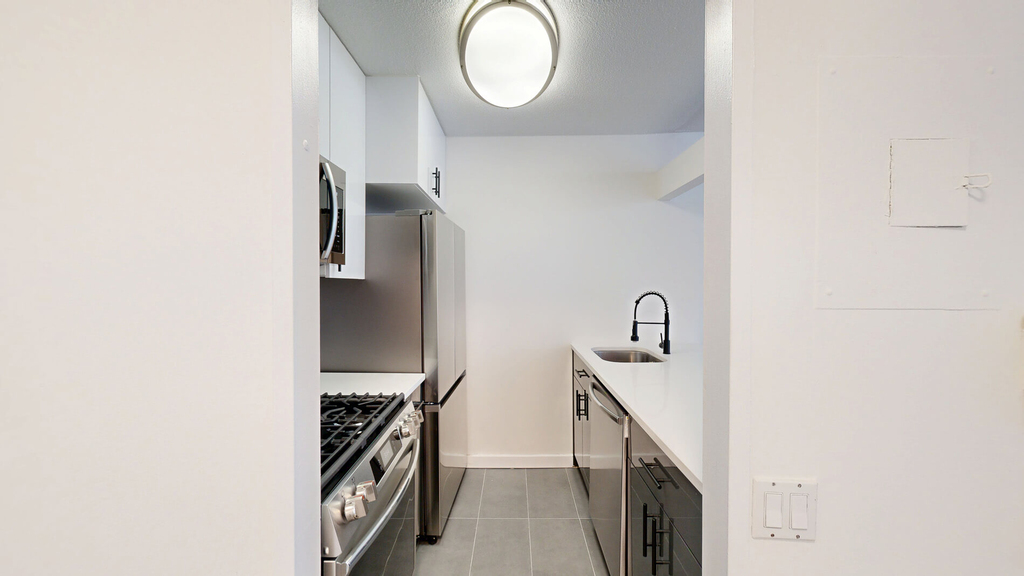 401 E 34th St - Photo 1