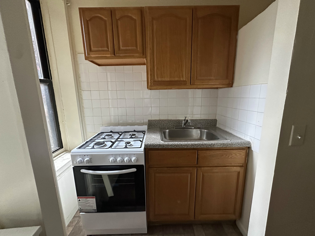 61-25 Woodside Avenue - Photo 1