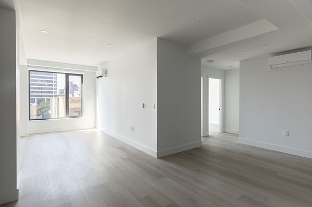 215 East 124th Street - Photo 1