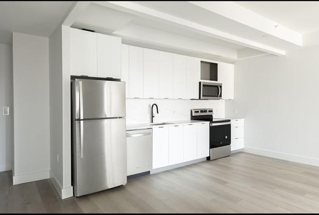 215 East 124th Street - Photo 2