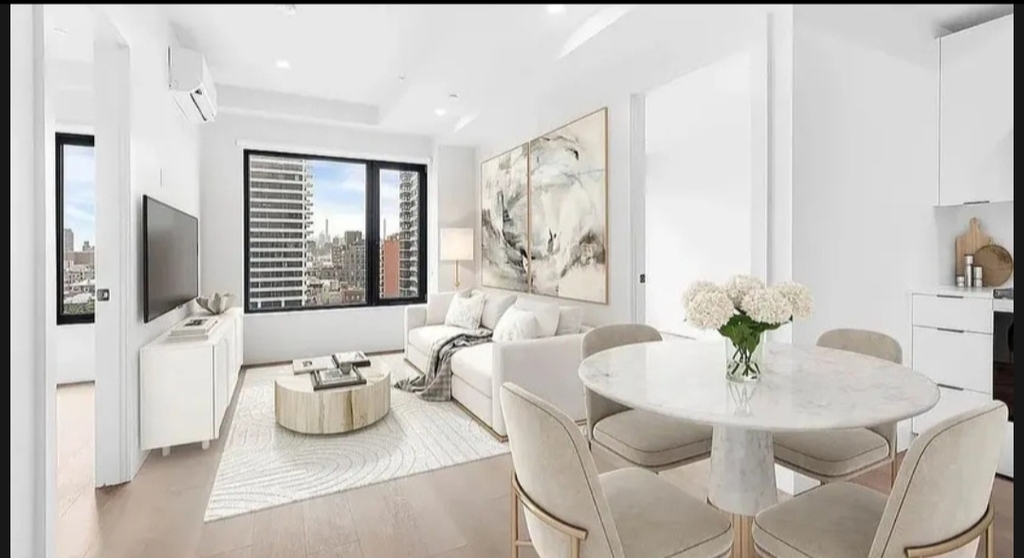 215 East 124th Street - Photo 0