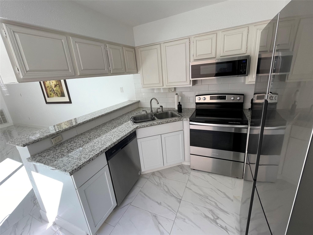 12255 W Village Drive - Photo 11