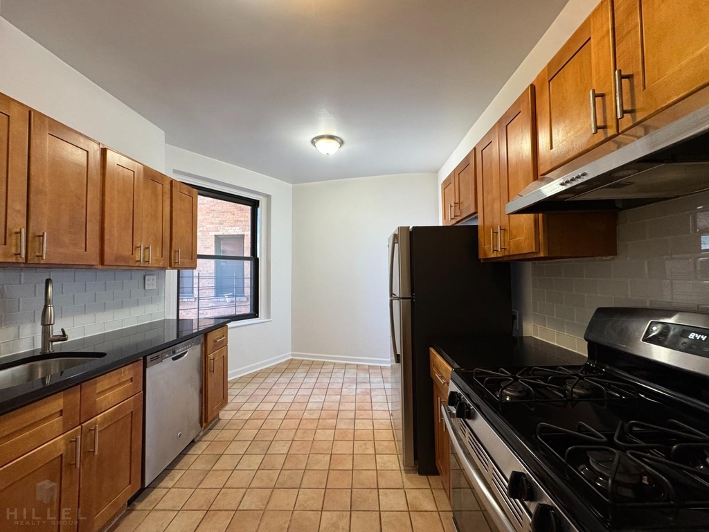 36-14 165th St - Photo 1