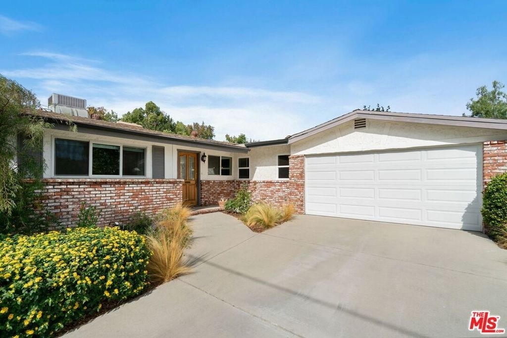 5211 Allott Avenue - Photo 0