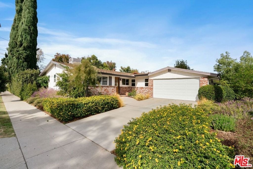 5211 Allott Avenue - Photo 1