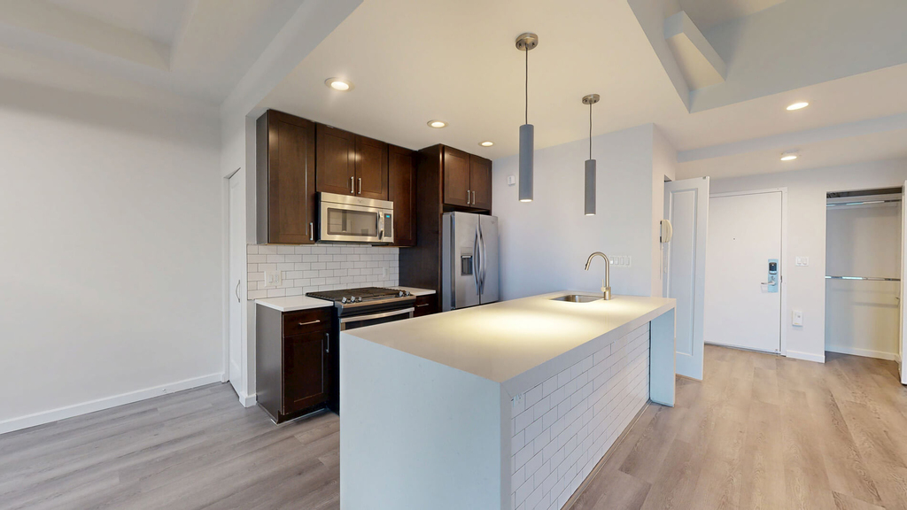 401 E 34th St - Photo 1