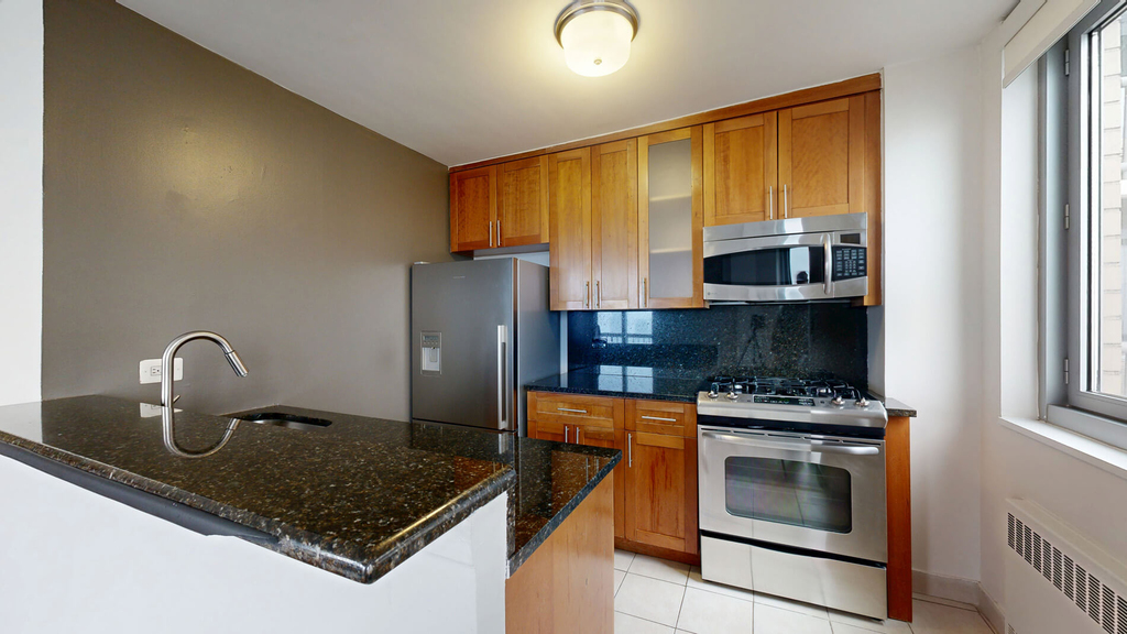 401 E 34th St - Photo 1