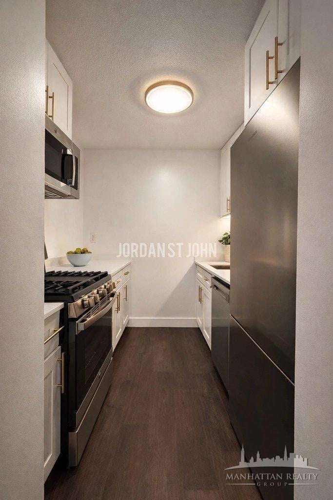E 28TH ST - Photo 8