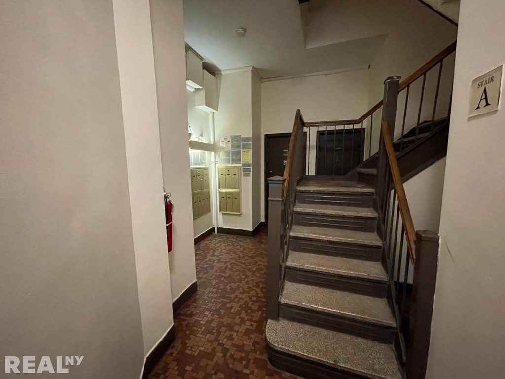 241 E 38th St - Photo 6