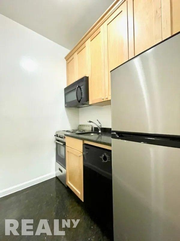 46 W 73rd St - Photo 1