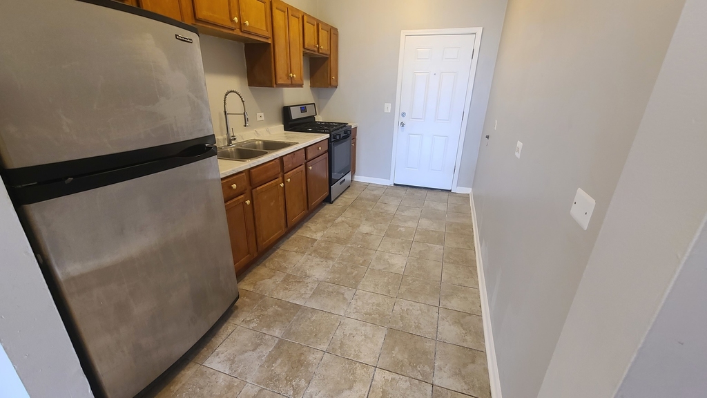 1409 E 69th Place - Photo 1