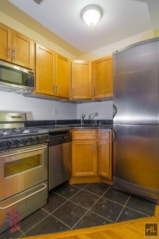 E 13th St. - Photo 1