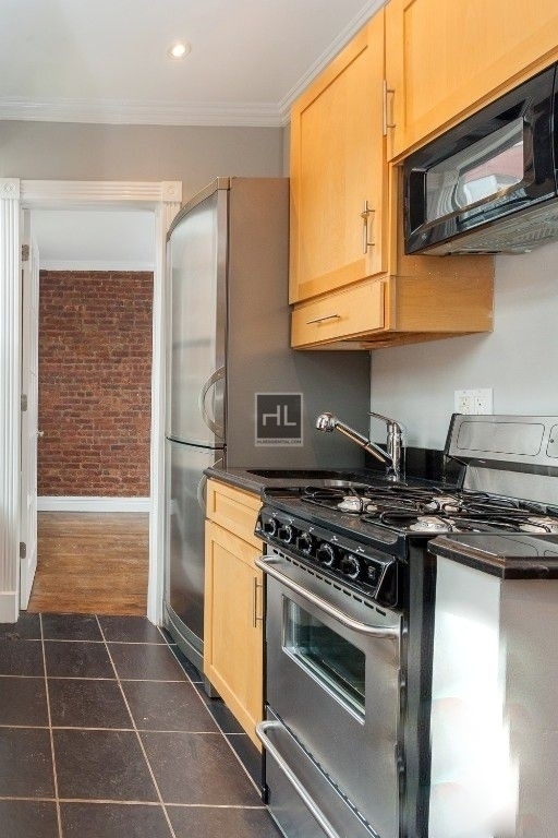 E 13th St. - Photo 2