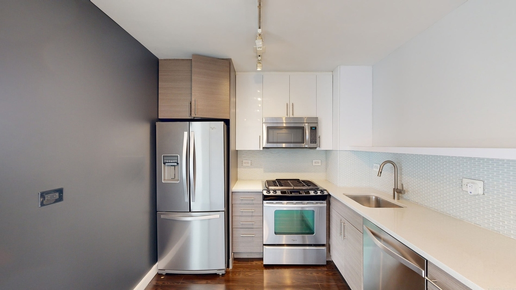 401 E 34th St - Photo 1