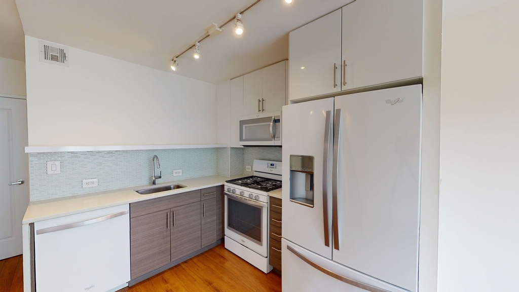 401 E 34th St - Photo 2
