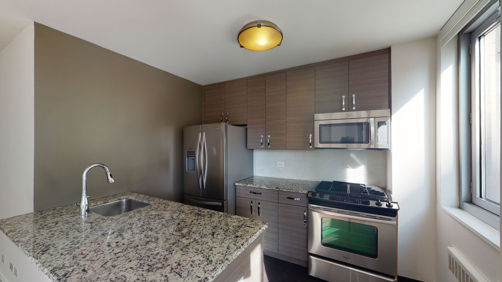 401 E 34th St - Photo 1