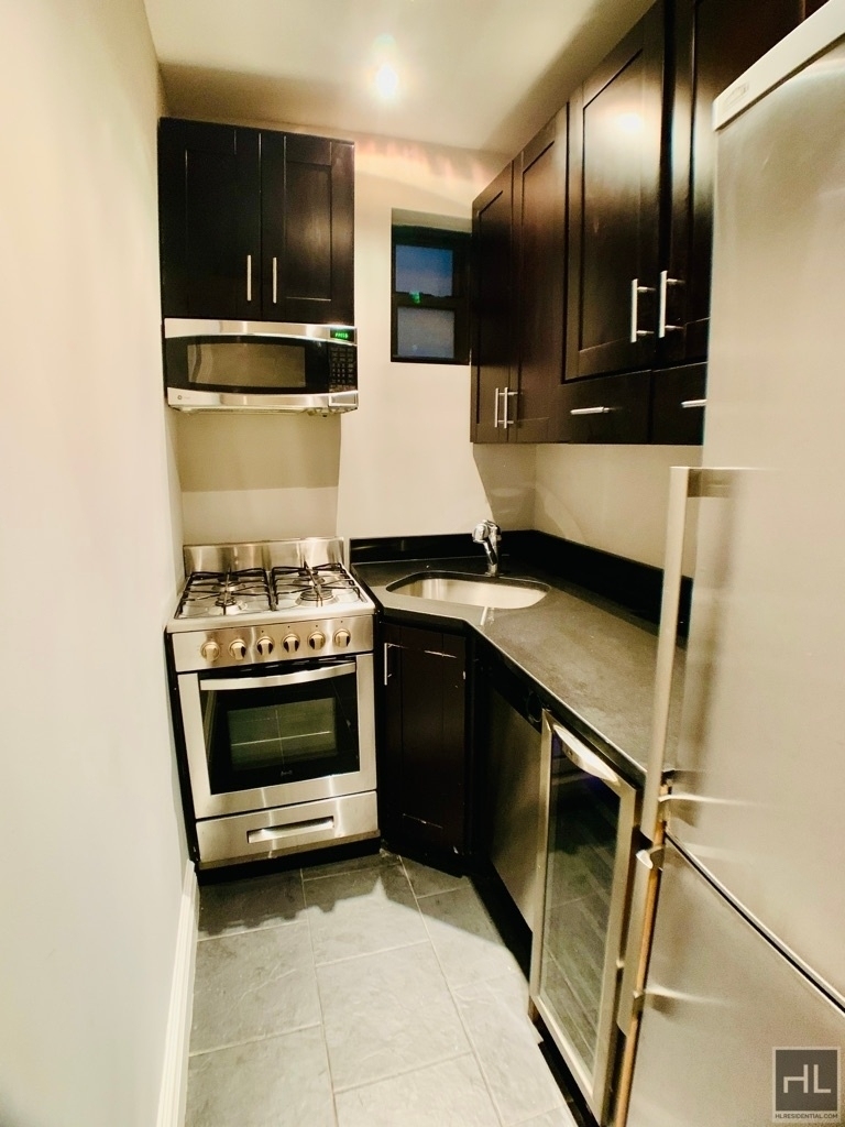 E 32nd St. - Photo 3