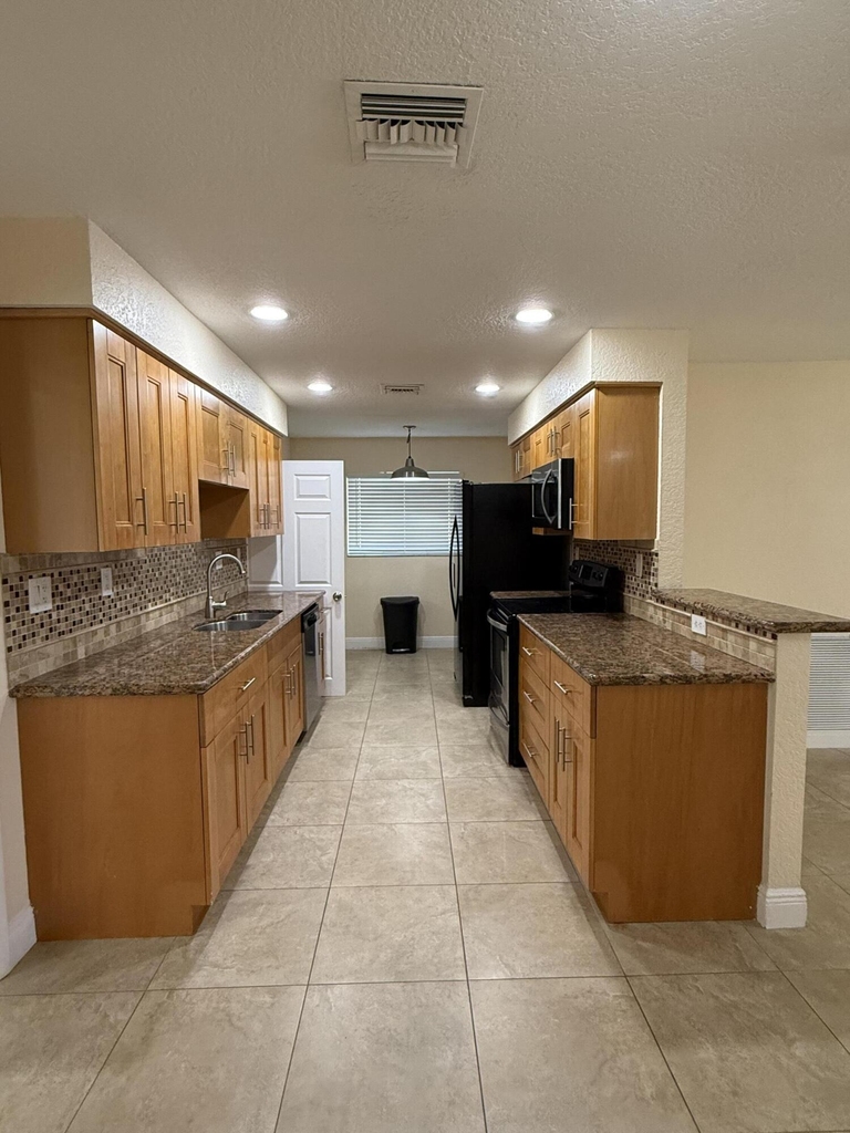 7302 Nw 57th Court - Photo 1