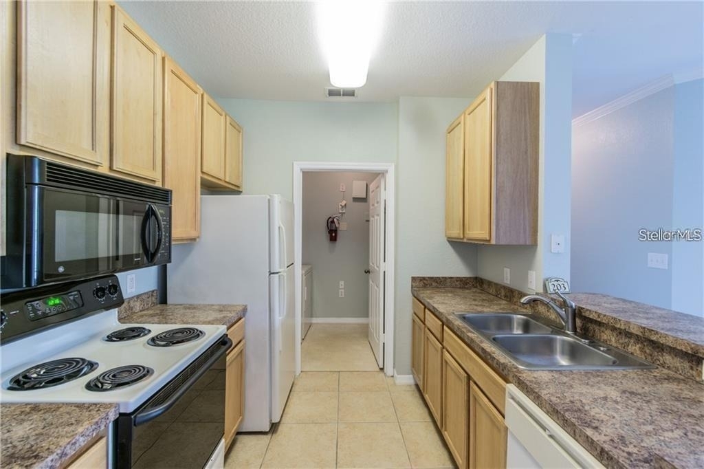 10203 Courtney Palms Boulevard - Photo 9