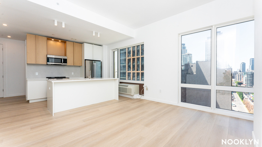 26-04 jackson ave - Photo 2