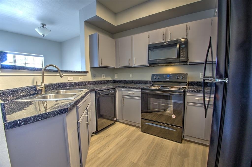 2320 Gracy Farms Unit #1323 - Photo 0
