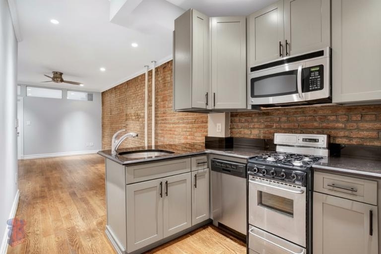 277 E 10th St - Photo 8