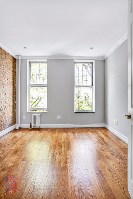 277 E 10th St - Photo 6