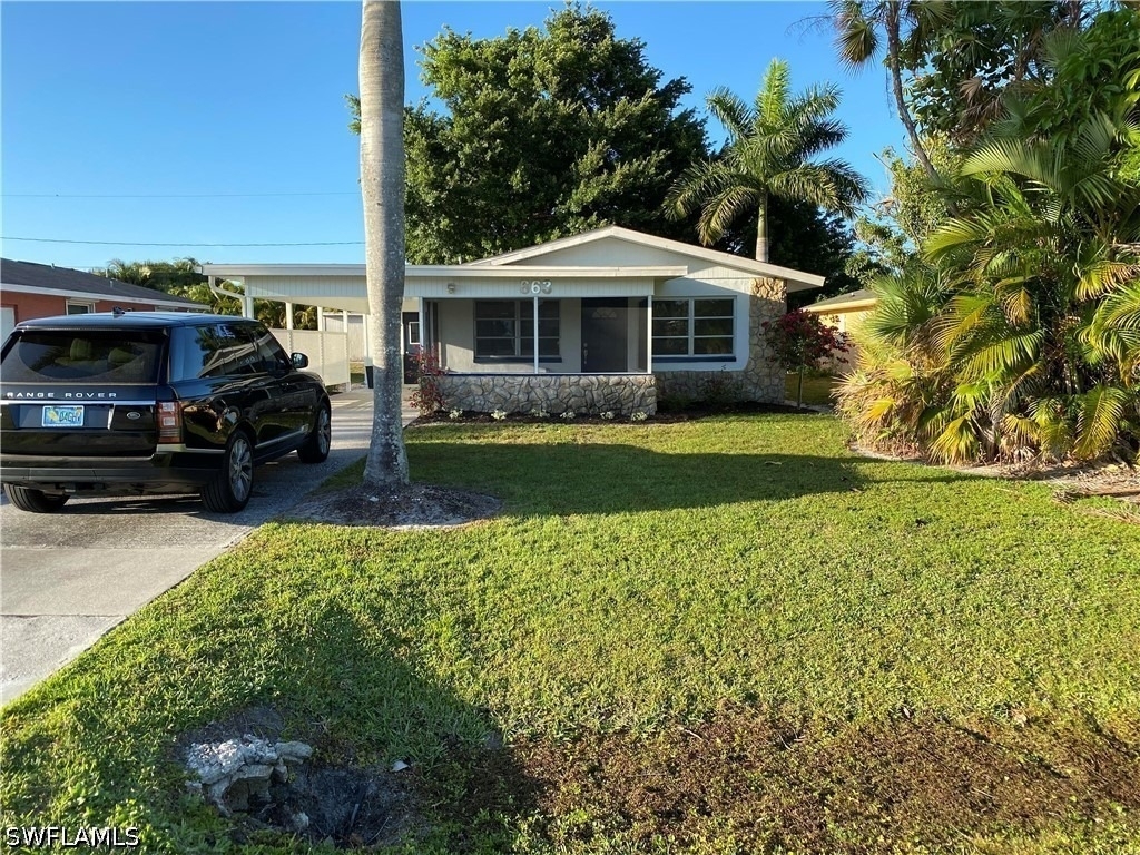 663 100th Avenue N - Photo 0