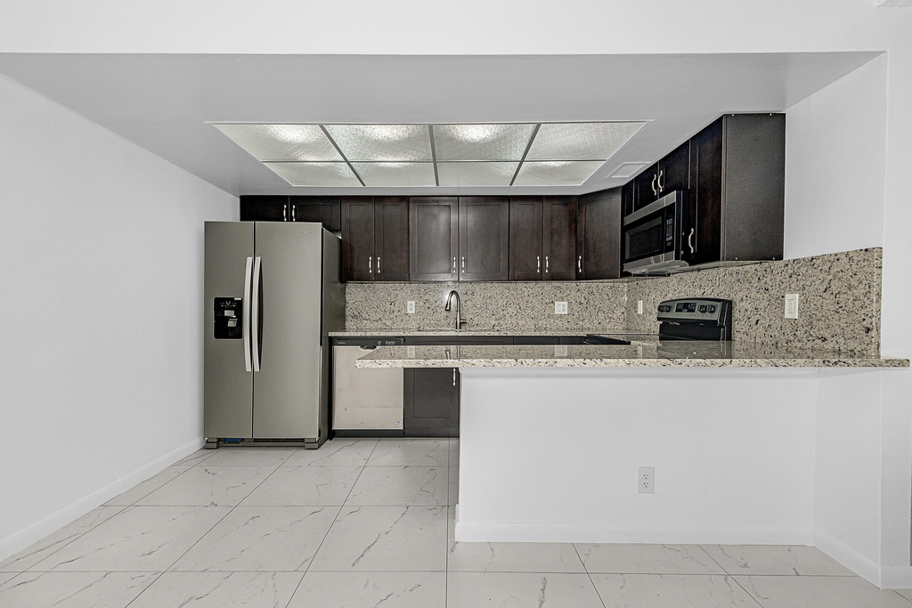 8706 W Sample Road - Photo 2