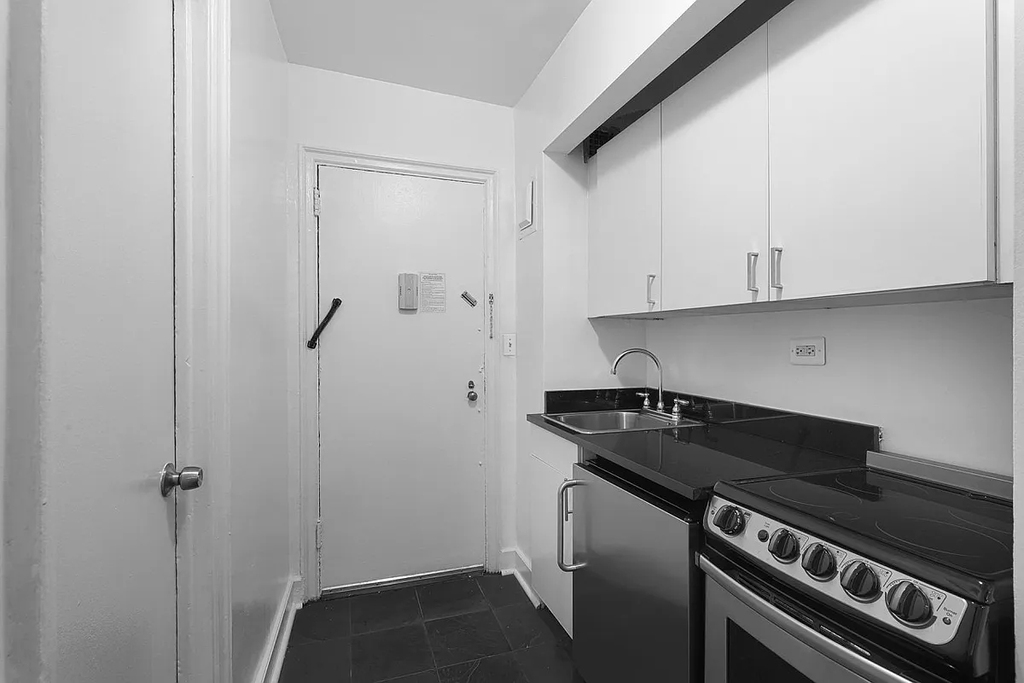 307-310 East 44th Street - Photo 0