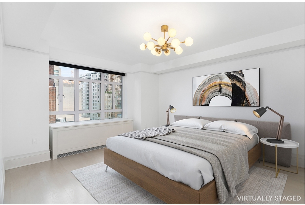 21 E 61st St - Photo 3
