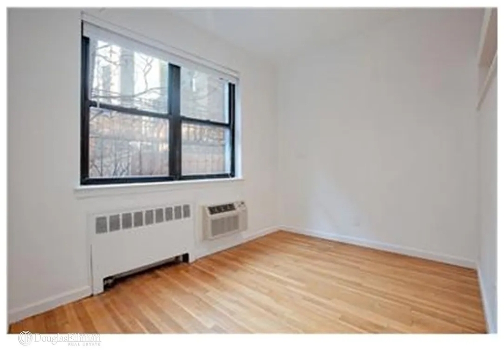 230 E 52nd St - Photo 1