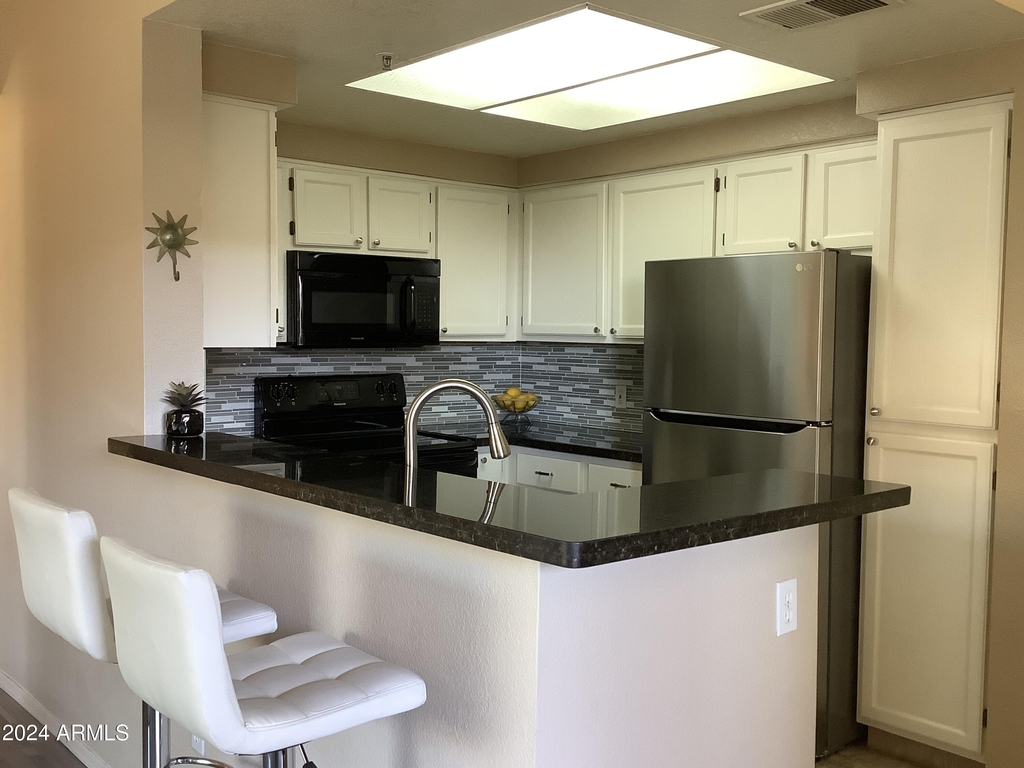 9450 E Becker Lane - Photo 4