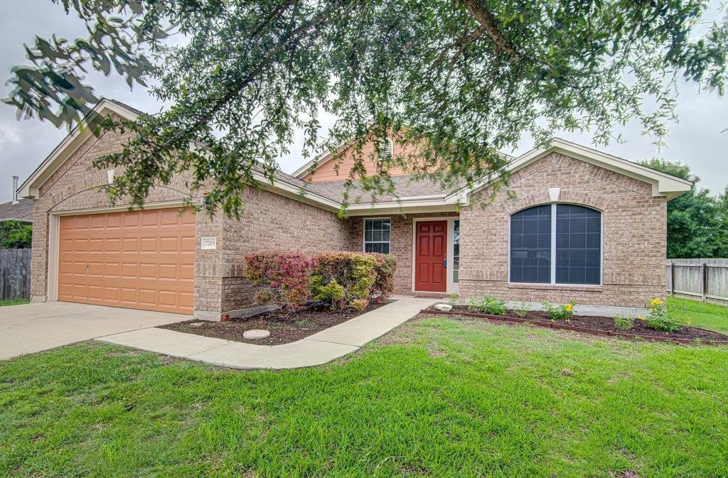 7705 Pebble Creek Dr - Photo 0