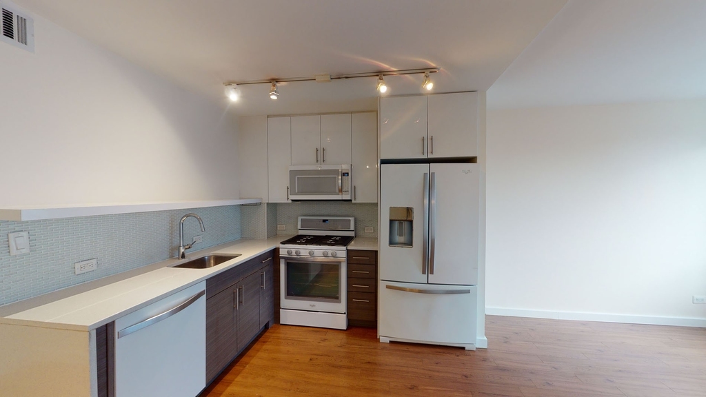 401 E 34th St - Photo 1