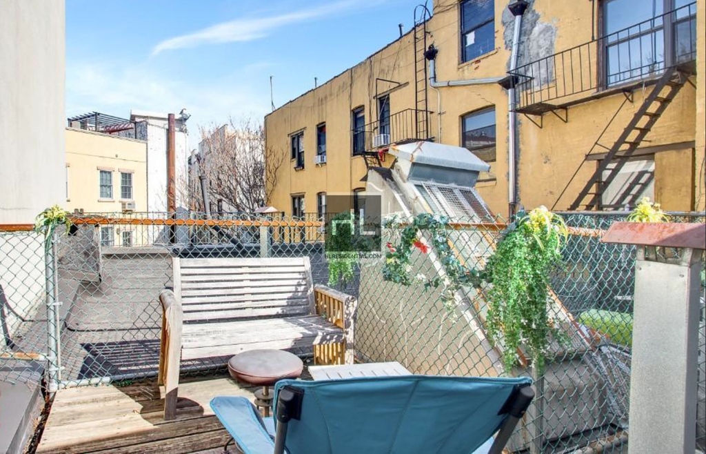 E 12th St. - Photo 2