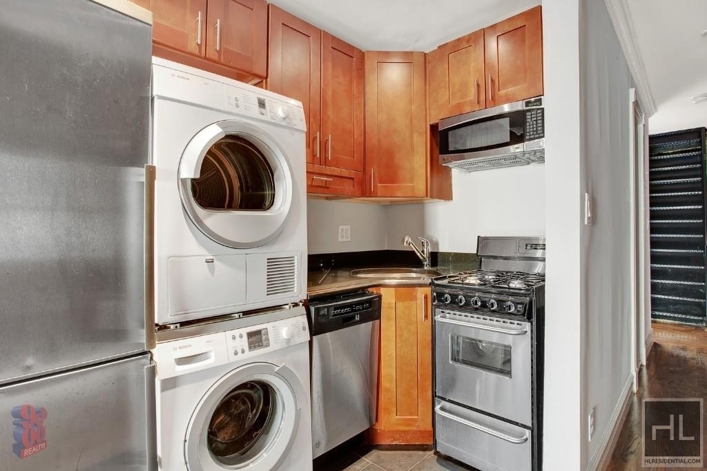 E 12th St. - Photo 1