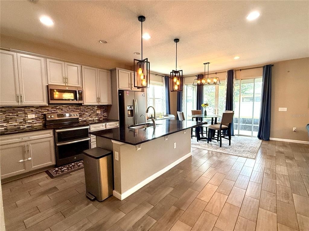 5608 Blowing Wind Place - Photo 1