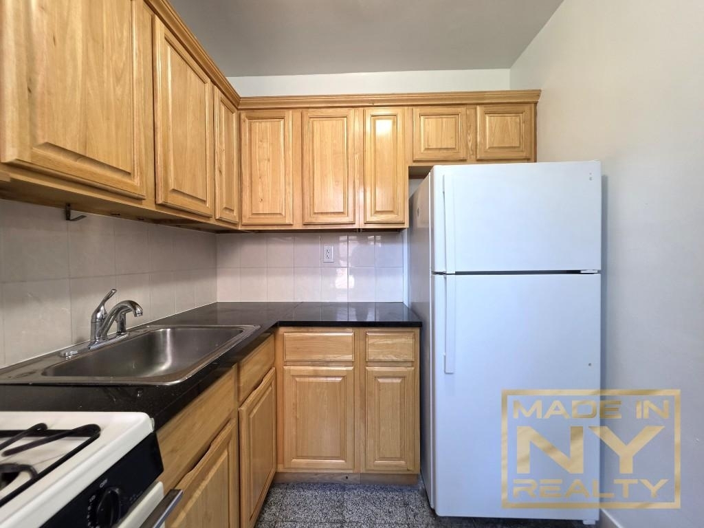 66-20 Wetherole St - Photo 0