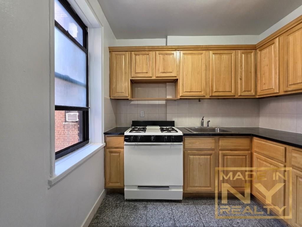 66-20 Wetherole St - Photo 1