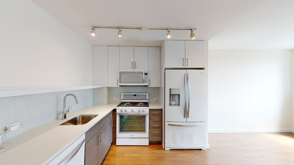 401 E 34th St - Photo 1
