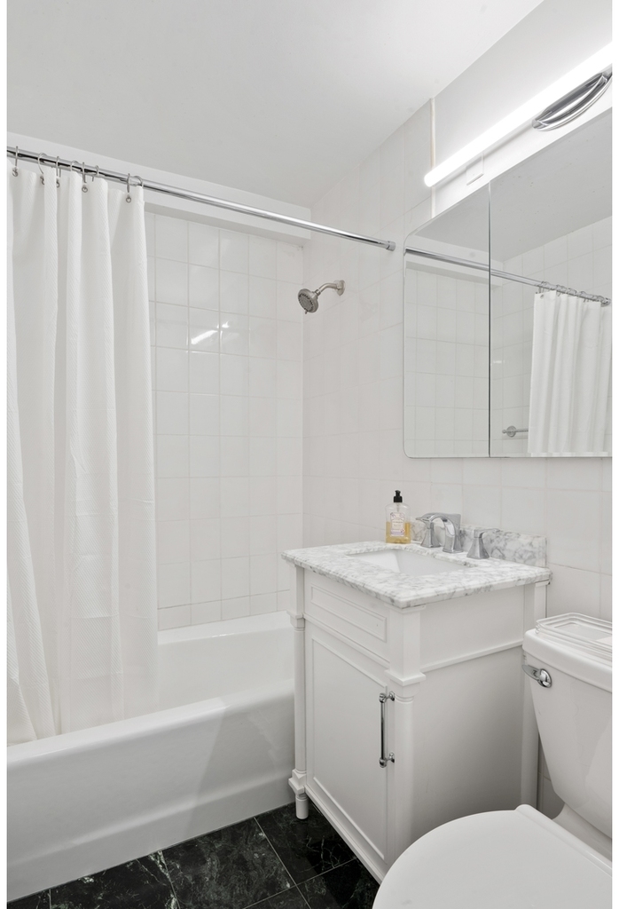 225 E 57th St - Photo 4