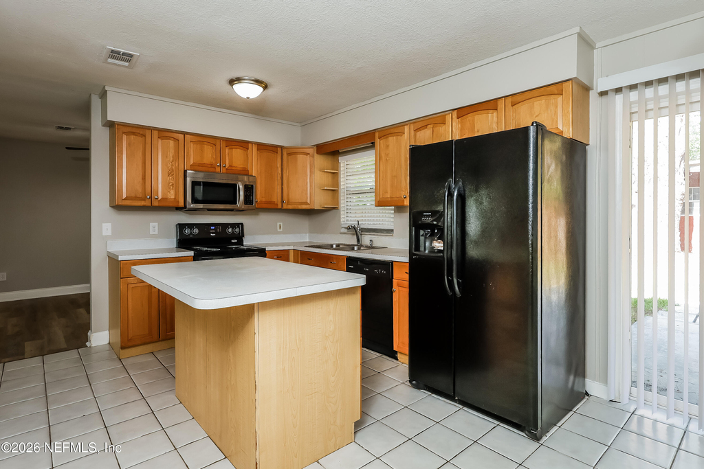 7930 Rondeau Drive E - Photo 2